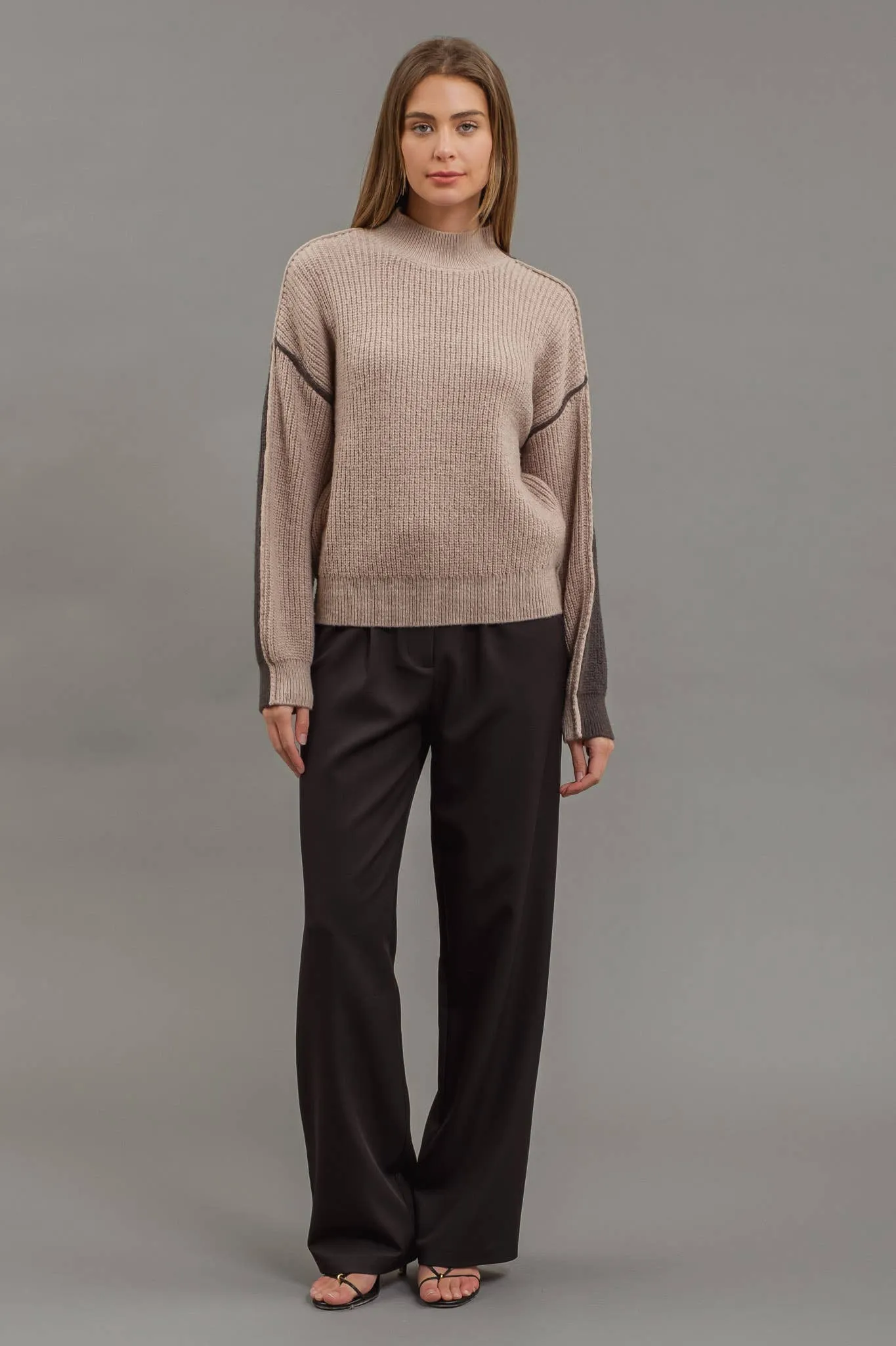 COLORBLOCK MOCK NECK EXPOSED SEAM KNIT SWEATER